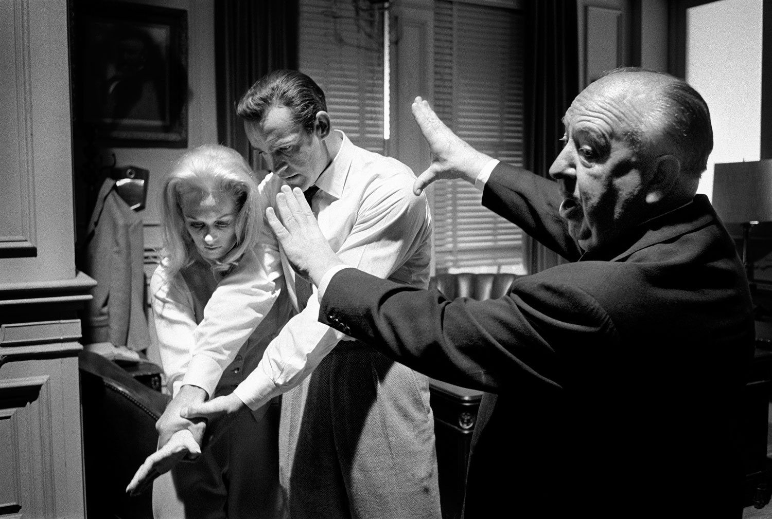 Alfred Hitchcock shows where he wants the camera on Sean Connery&Tippi Hedren on set of 